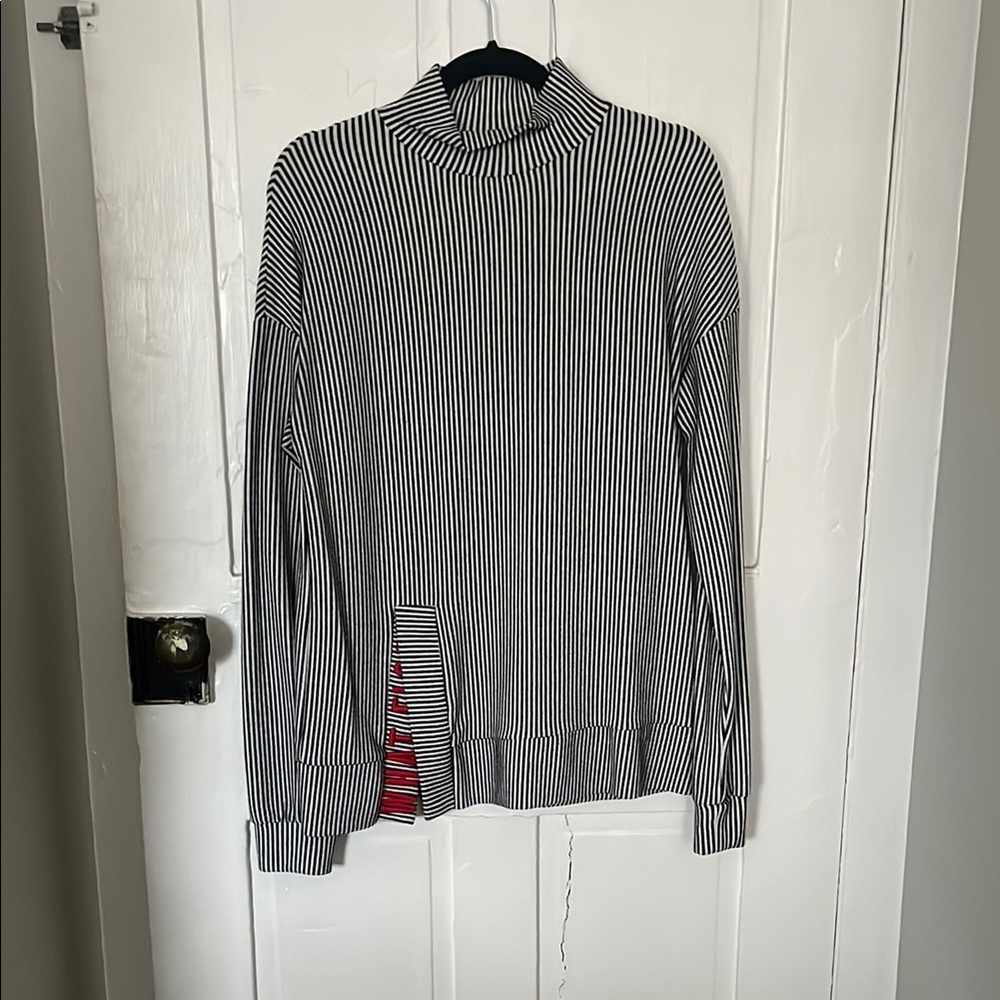 Striped Black and White Sweater with Graphic Deatil